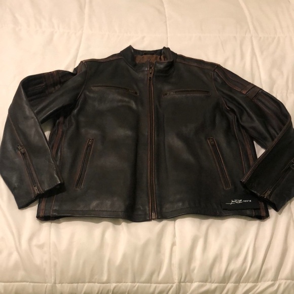 Black Rivet Other - NWT Black Rivet genuine leather Moto style jacket with multiple zippers pockets